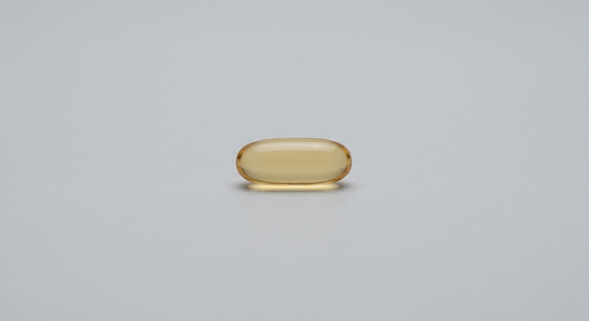 A single vitamin E softgel capsule
